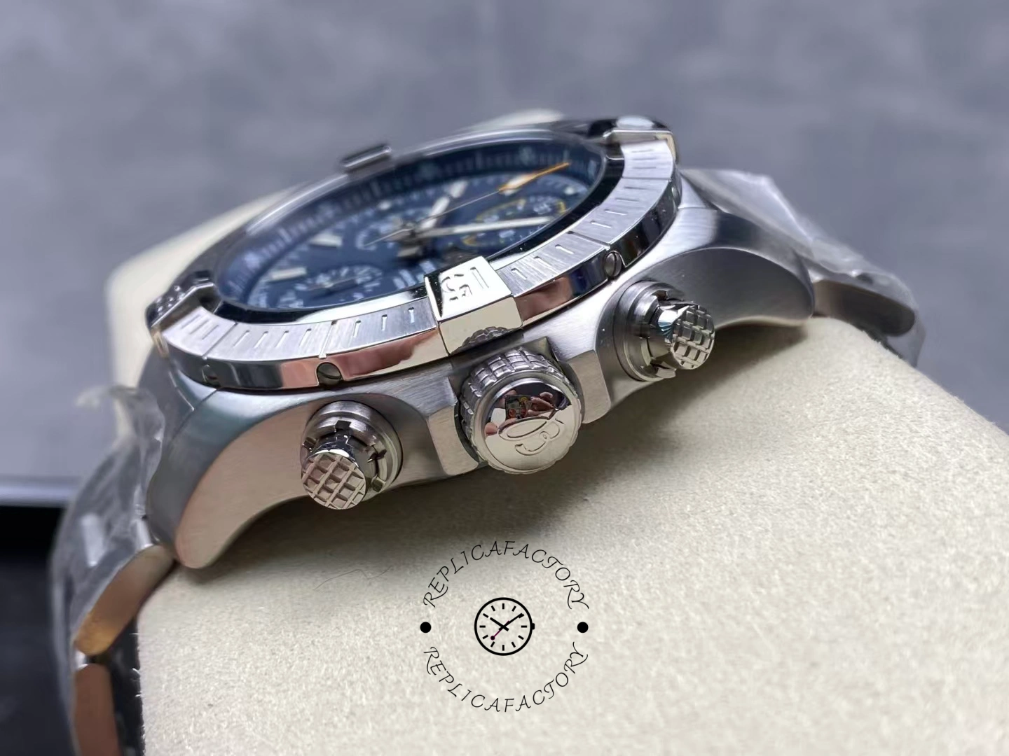 Side view of Breitling Avenger Chronograph 45 A13317101C1A1 showing crown and pushers.