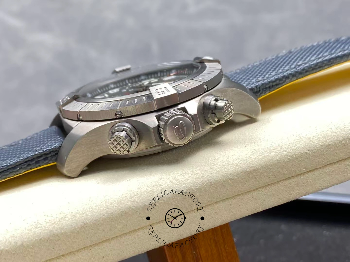 Side view of Breitling Avenger Bandit E13383101M1W1 showing crown and chronograph pushers.