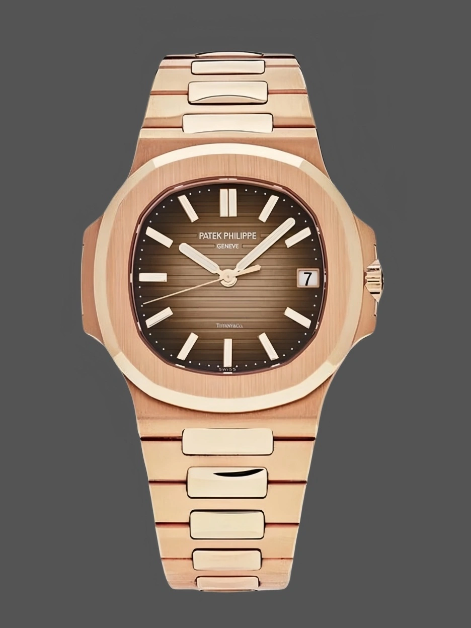Full front image of the Patek Philippe Nautilus 5711/1R with brown sunburst dial and rose gold bracelet.