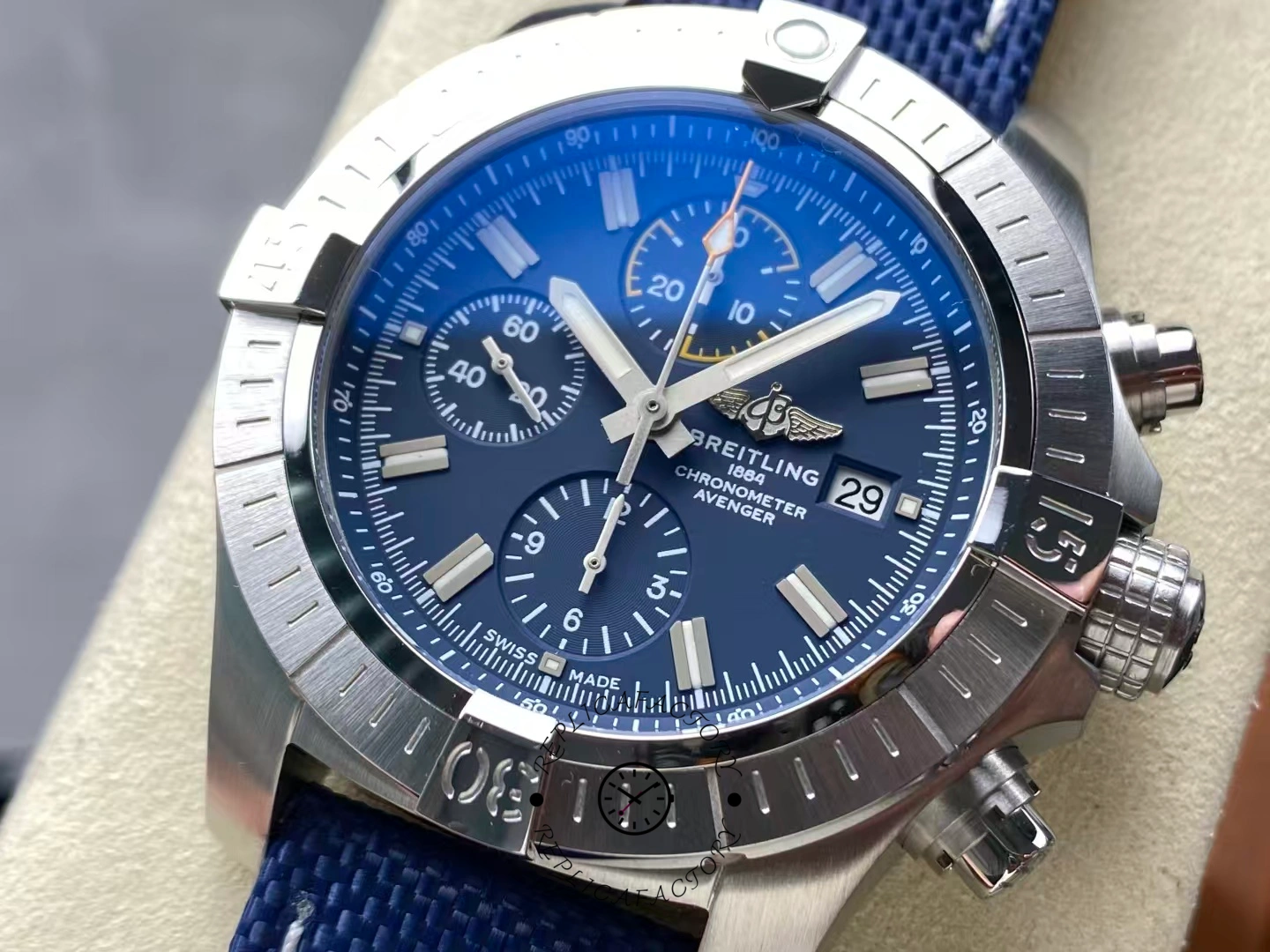 Close-up of Breitling Avenger Chronograph 45 A13317101C1X1 blue dial with luminous markers.