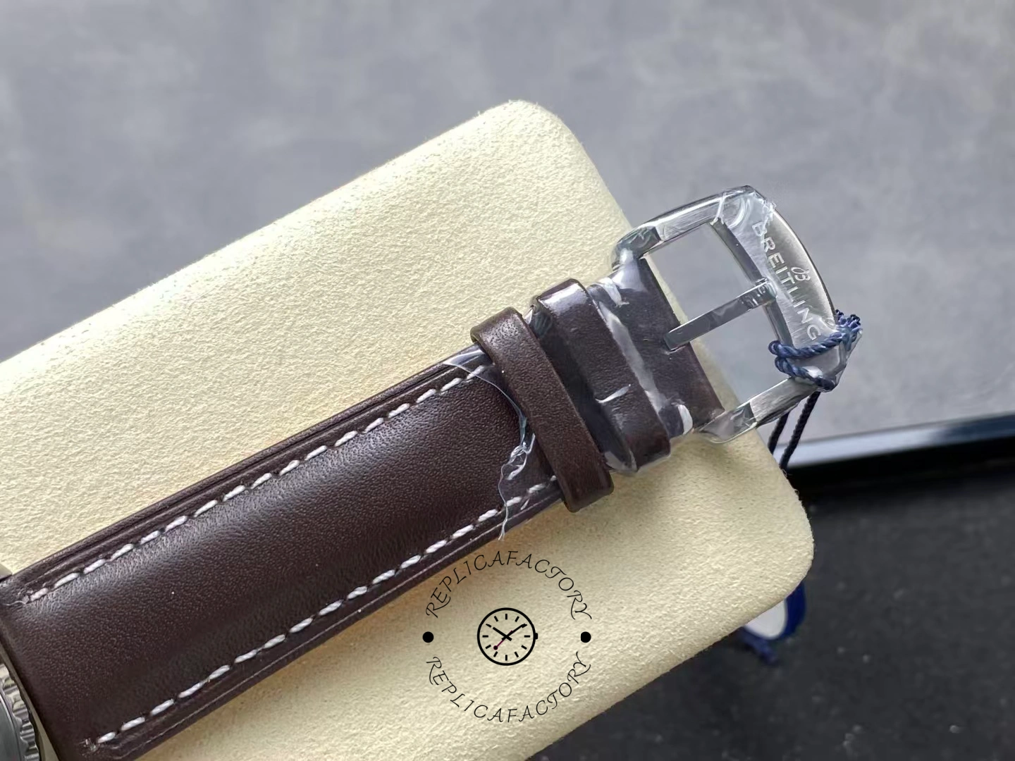 Buckle close-up of Breitling Aviator 8 B35 Automatic 43 AB3521U01G1P1 with engraved clasp.