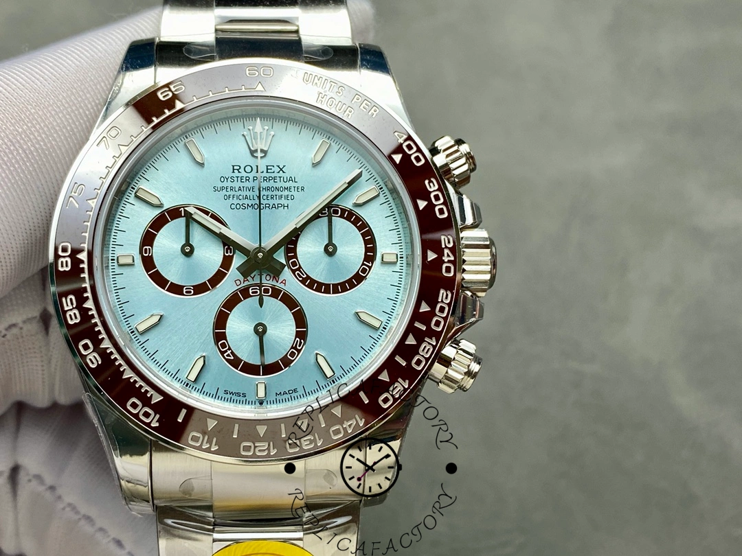Close-up of the Rolex Daytona 126506 dial showing sub-dials and brown ceramic bezel details.