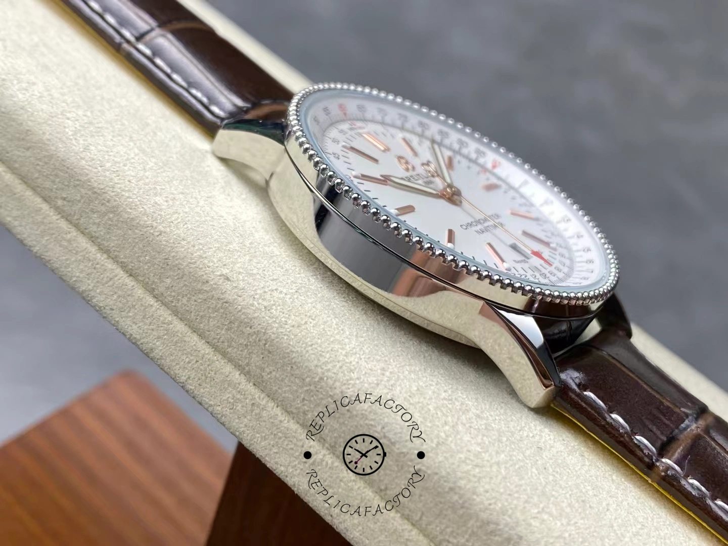 Left side of Breitling Navitimer 41 A17326211G1P1 showing polished steel case.