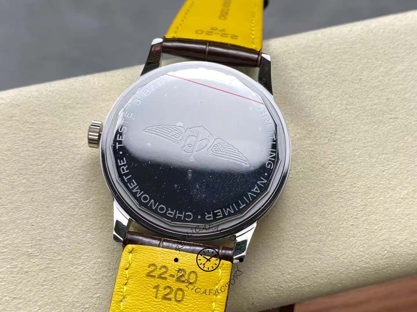 Caseback of Breitling Navitimer 41 U17326211M1P1 showing engraved wings logo.