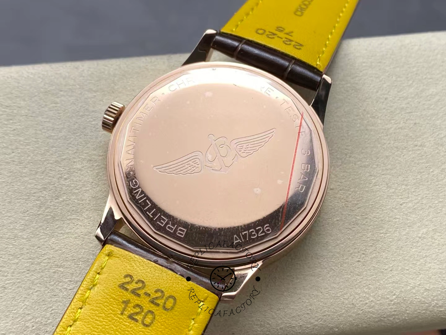 Caseback of Breitling Navitimer 41 R17326211G1P1 showing engraved wings logo.