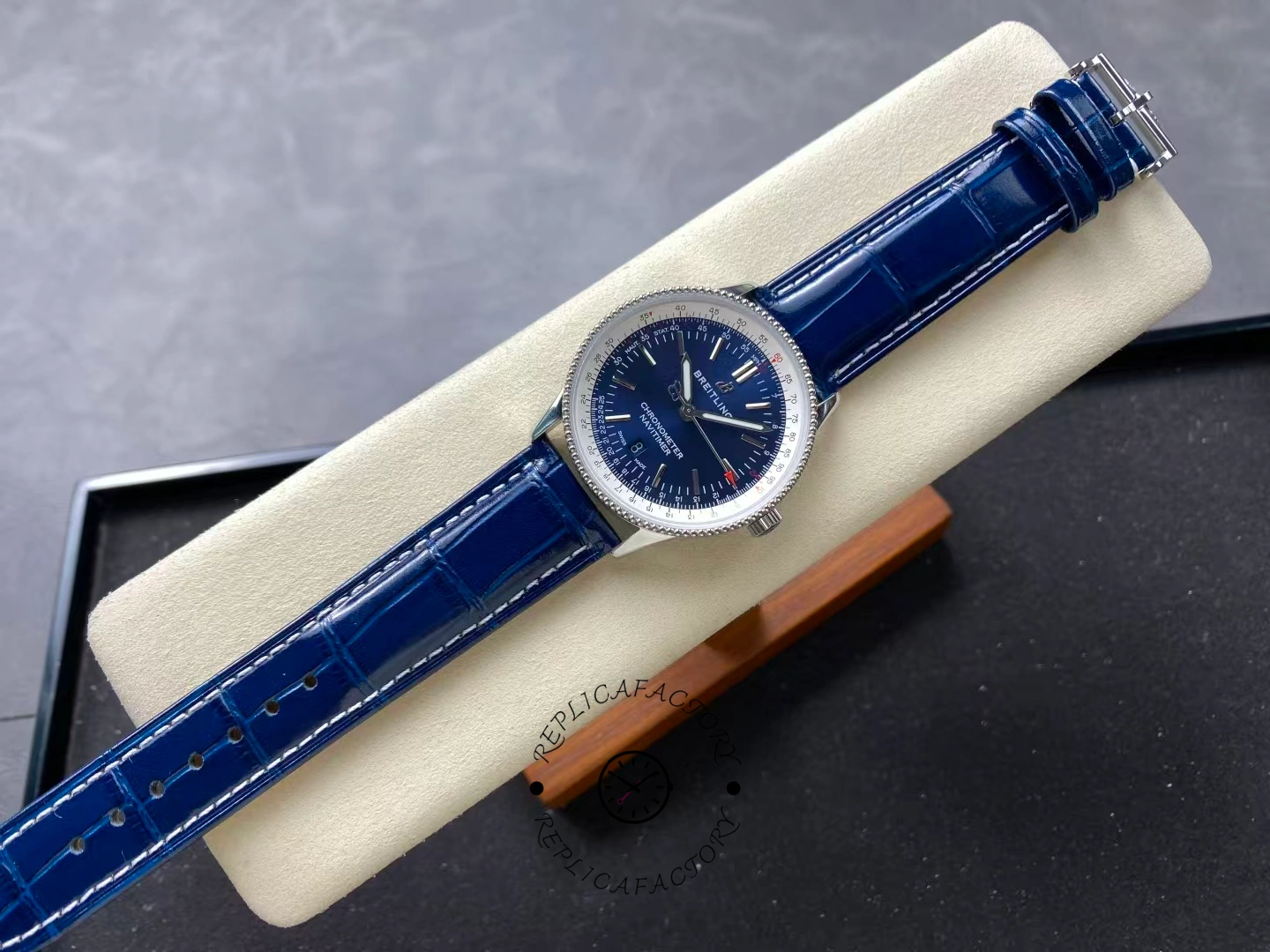 Full view of Breitling Navitimer 38 A17325211C1P1 with blue leather strap.