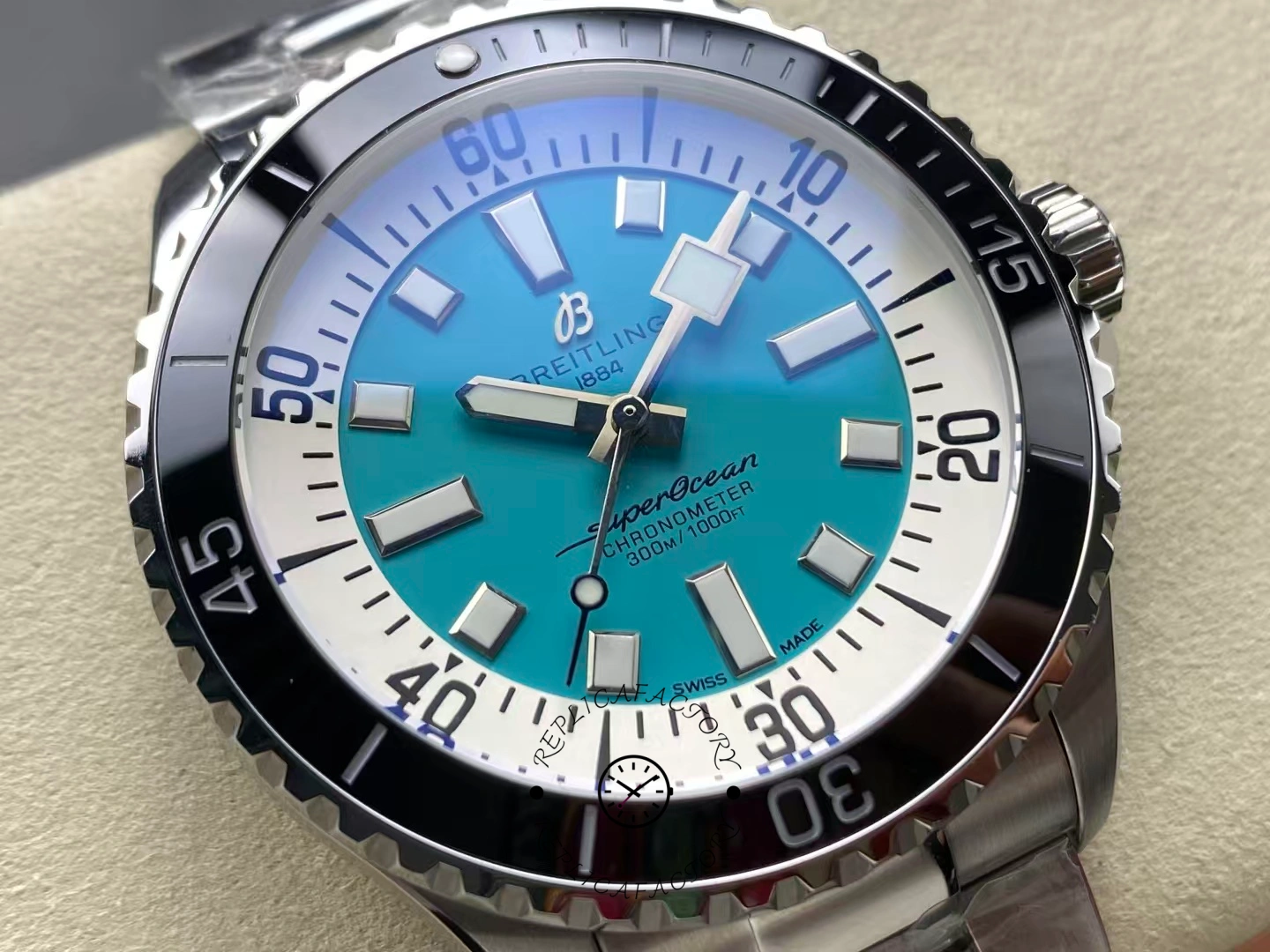 Macro of Breitling Superocean 44 A17376211L2A1 dial showing luminous markers.