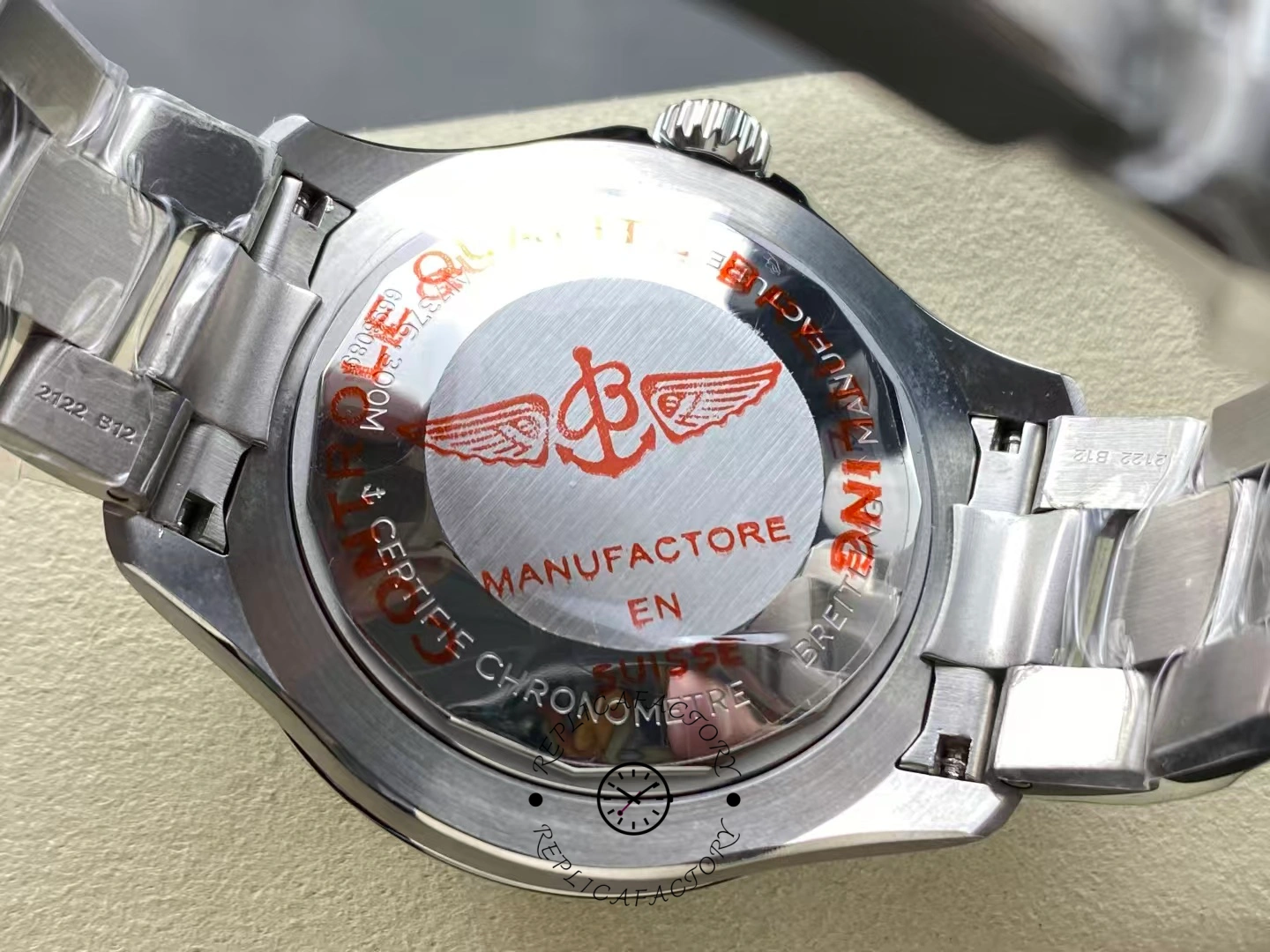 Caseback of Breitling Superocean 44 A17376211B1A1 showing red logo engraving.