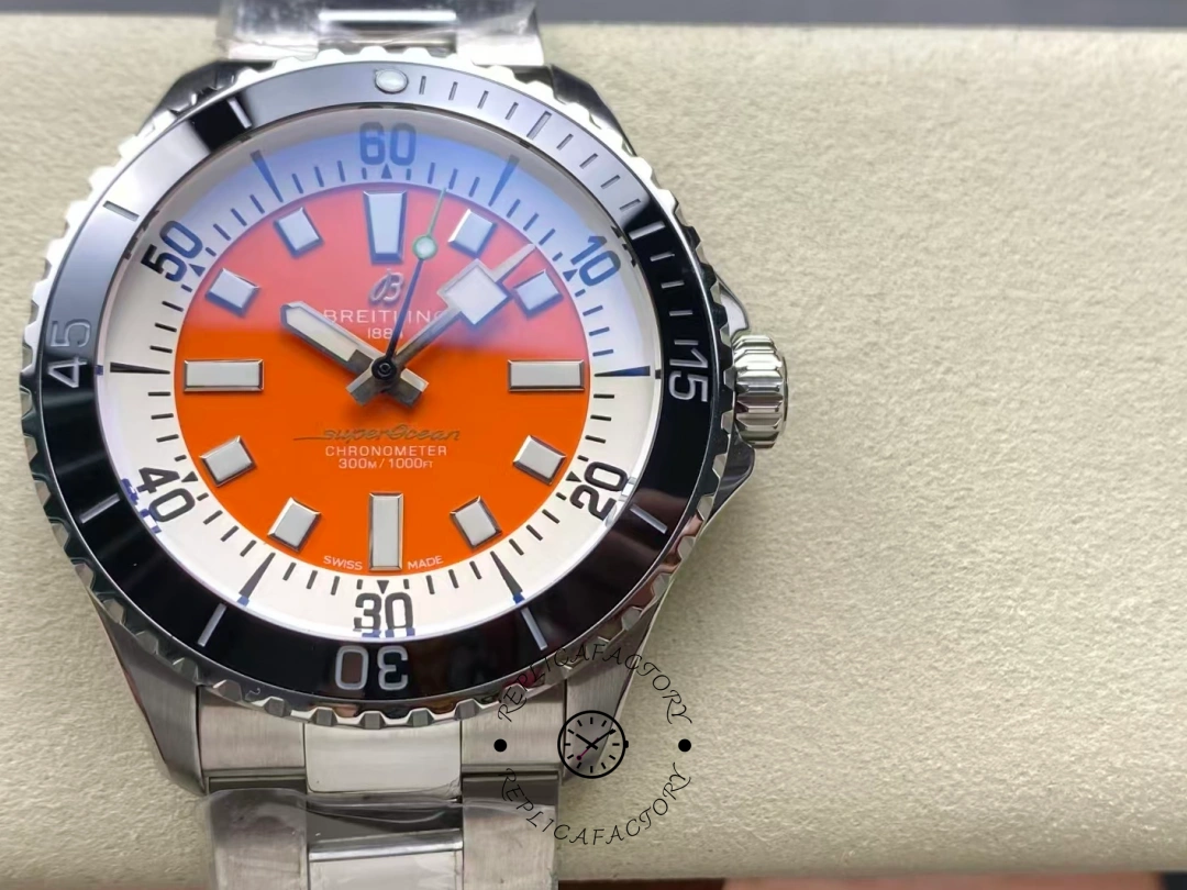 Front view of Breitling Superocean 42 A173751A1O1S1 orange dial dive watch with steel bracelet. - Front view