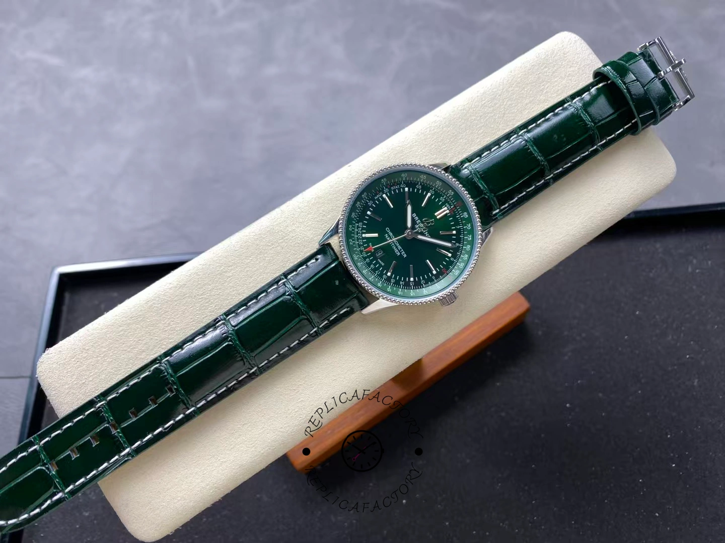 Full view of Breitling Navitimer 41 A17326361L1P1 with green dial and alligator leather strap.