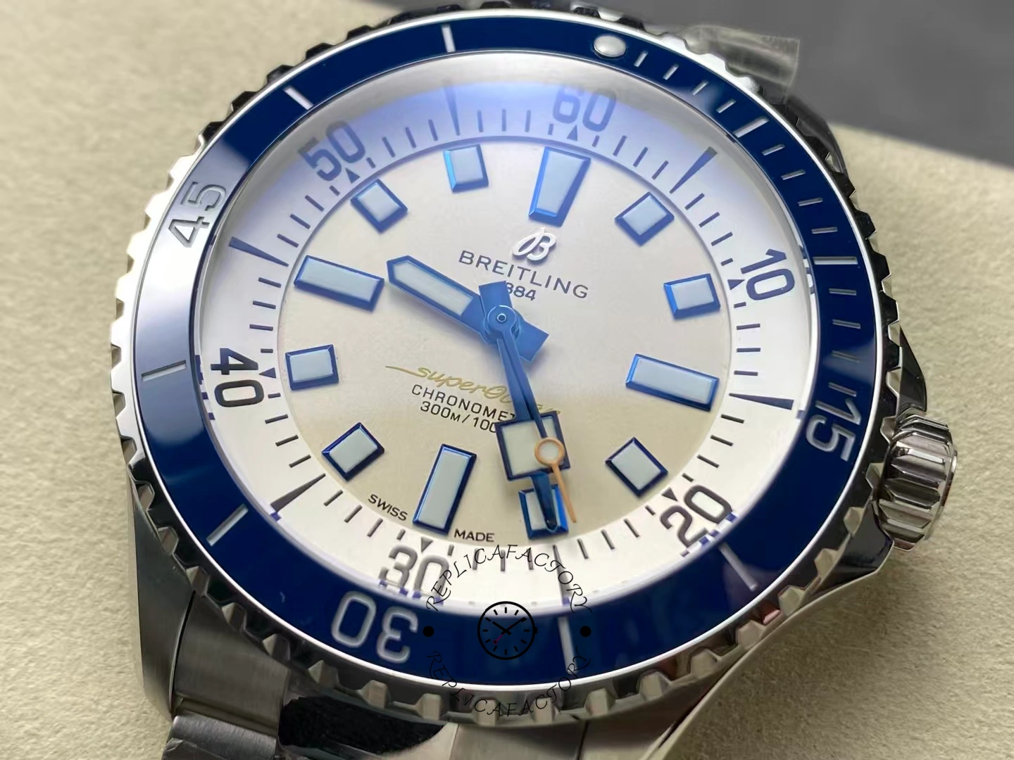 Macro of Breitling Superocean 42 A17375E71G1A1 white dial and blue accents.