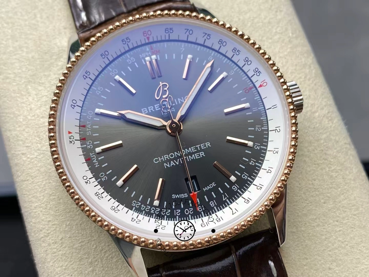 Close-up of Breitling Navitimer 41 U17326211M1P1 grey dial with rose gold bezel.