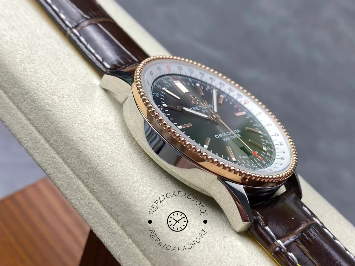 Left side of Breitling Navitimer 41 U17326211M1P1 showing rose gold bezel edge.