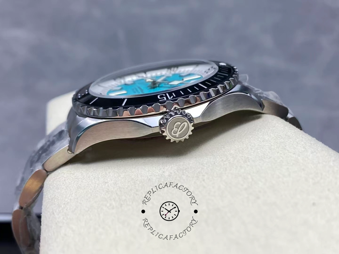 Side view of Breitling Superocean 44 A17376211L2A1 showing signed crown and bezel teeth.