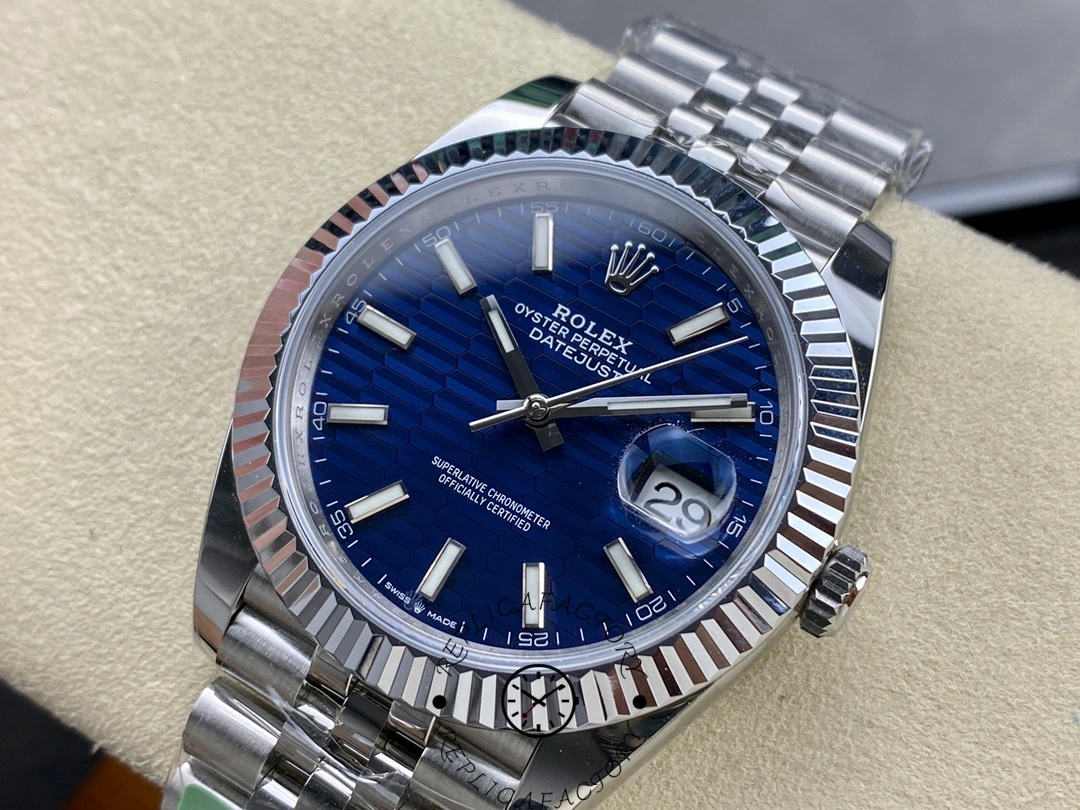Rolex Datejust 126334 ARF with blue textured dial, focusing on fluted bezel and date window.