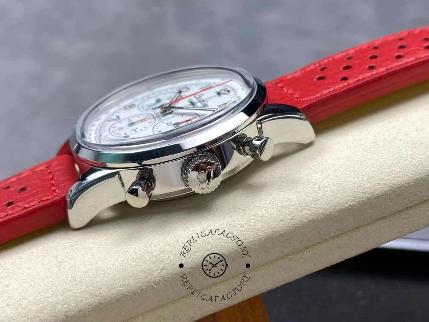 Side view of Breitling Top Time B01 AB01766A1A1X1 showing crown and pushers.