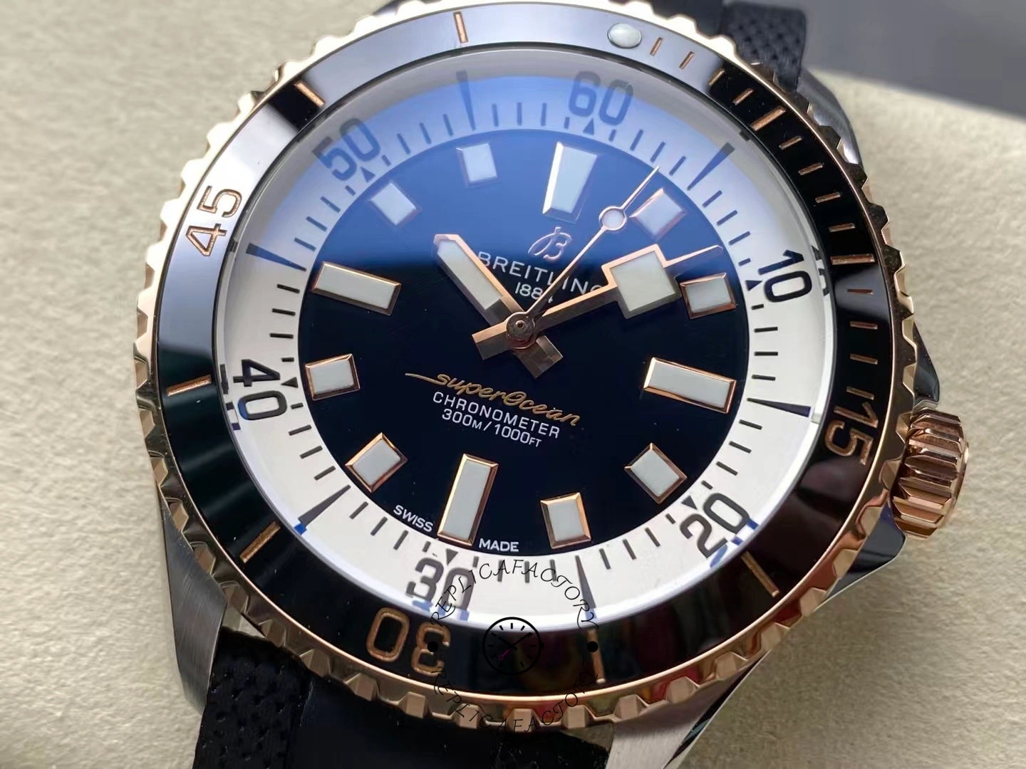 Close-up of Breitling Superocean 42 U17375211B1S1 black dial with gold accents.