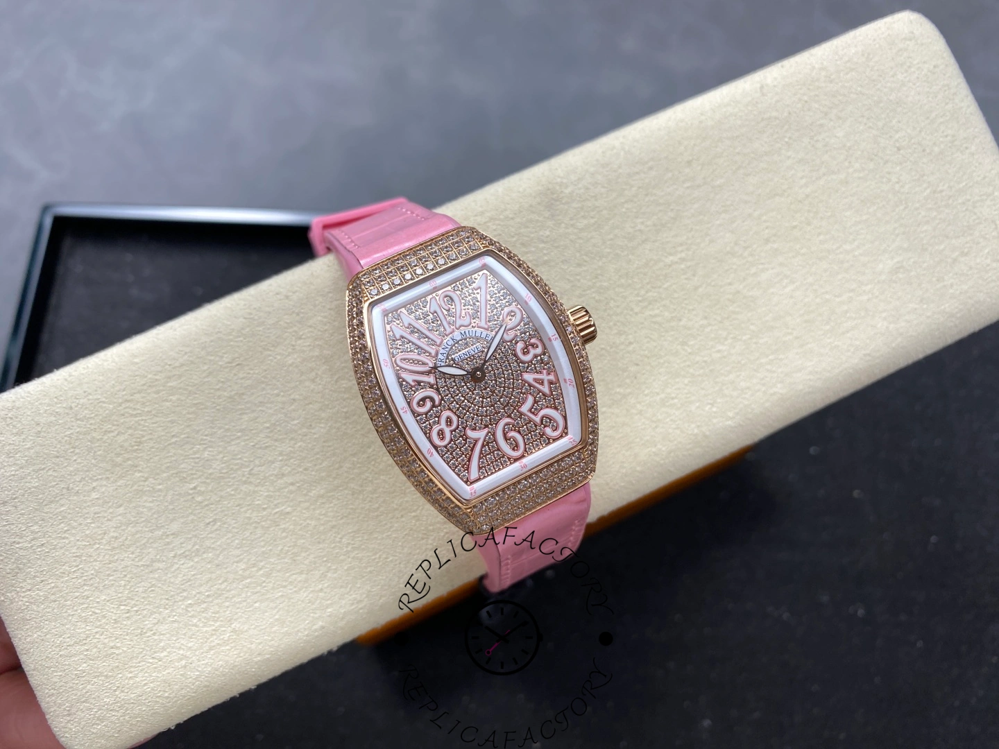 Full watch view of the Franck Muller V 32 SC AT FO D CD AC RS AC with pink strap and diamond case.