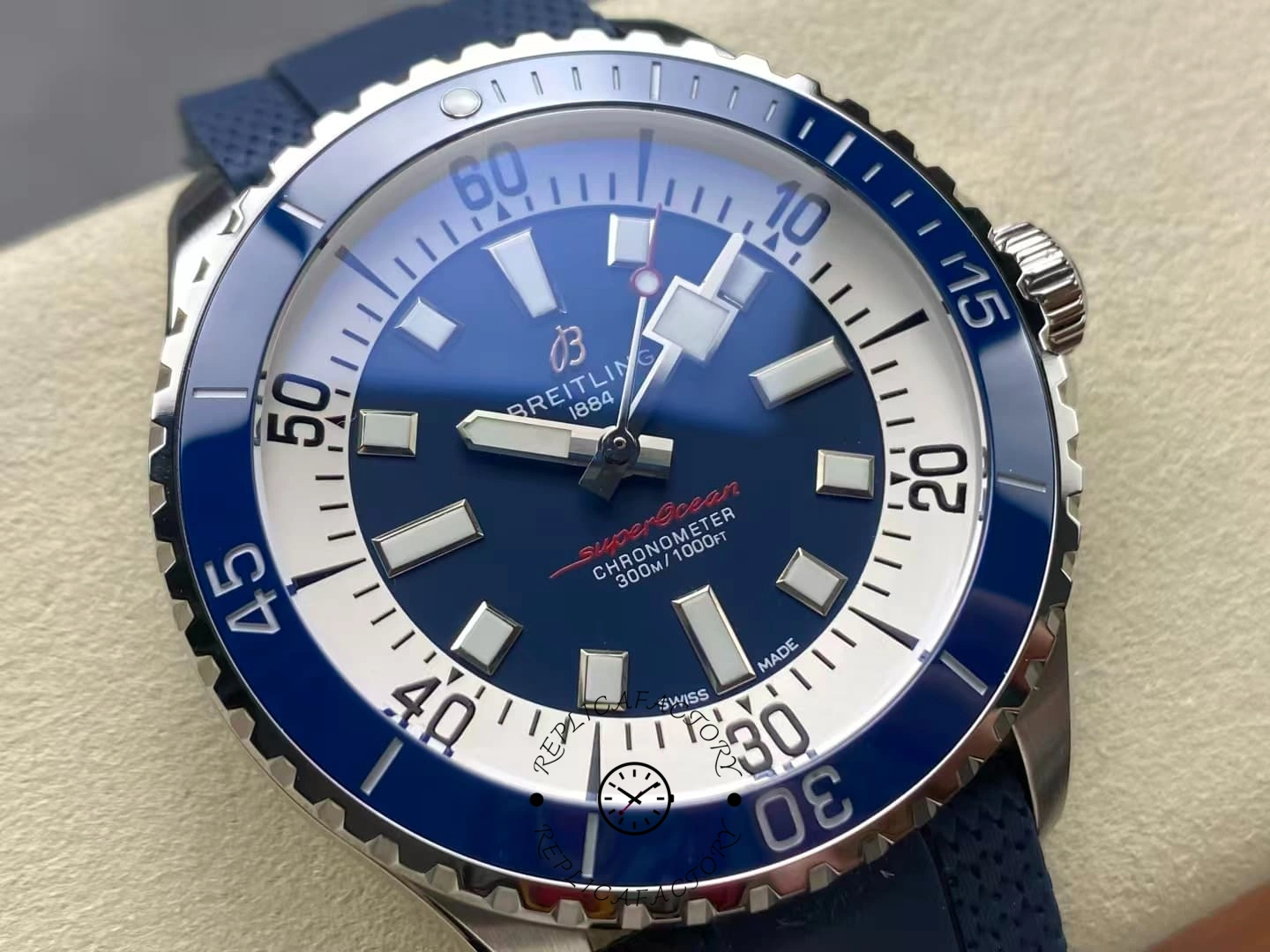 Macro shot of Breitling Superocean A17375E71C1S1 blue dial chronometer 300m.