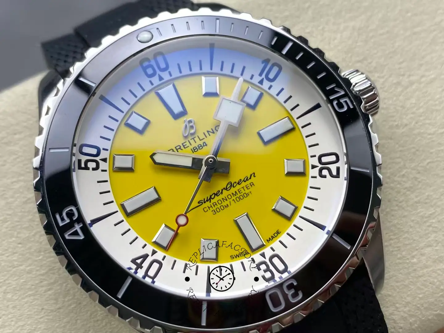 Macro shot of Breitling Superocean A17375211I1S1 yellow dial 300m chronometer.