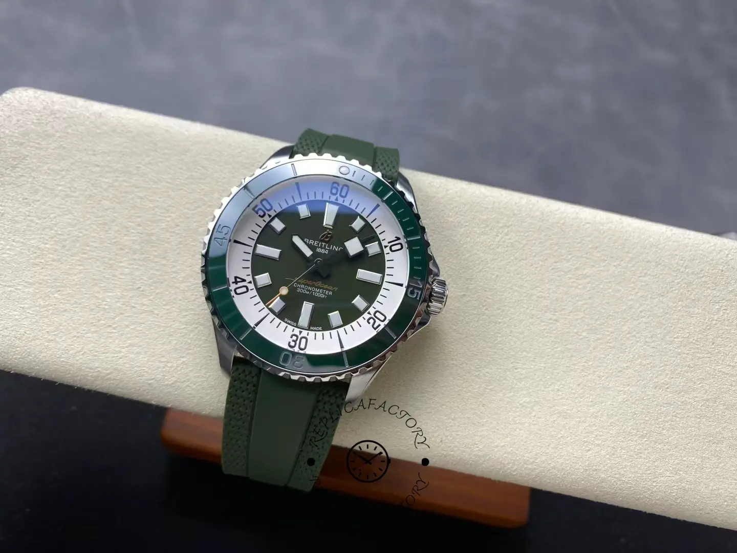 Angled top view of Breitling Superocean A17376A31L1S1 green dial with white chapter ring.