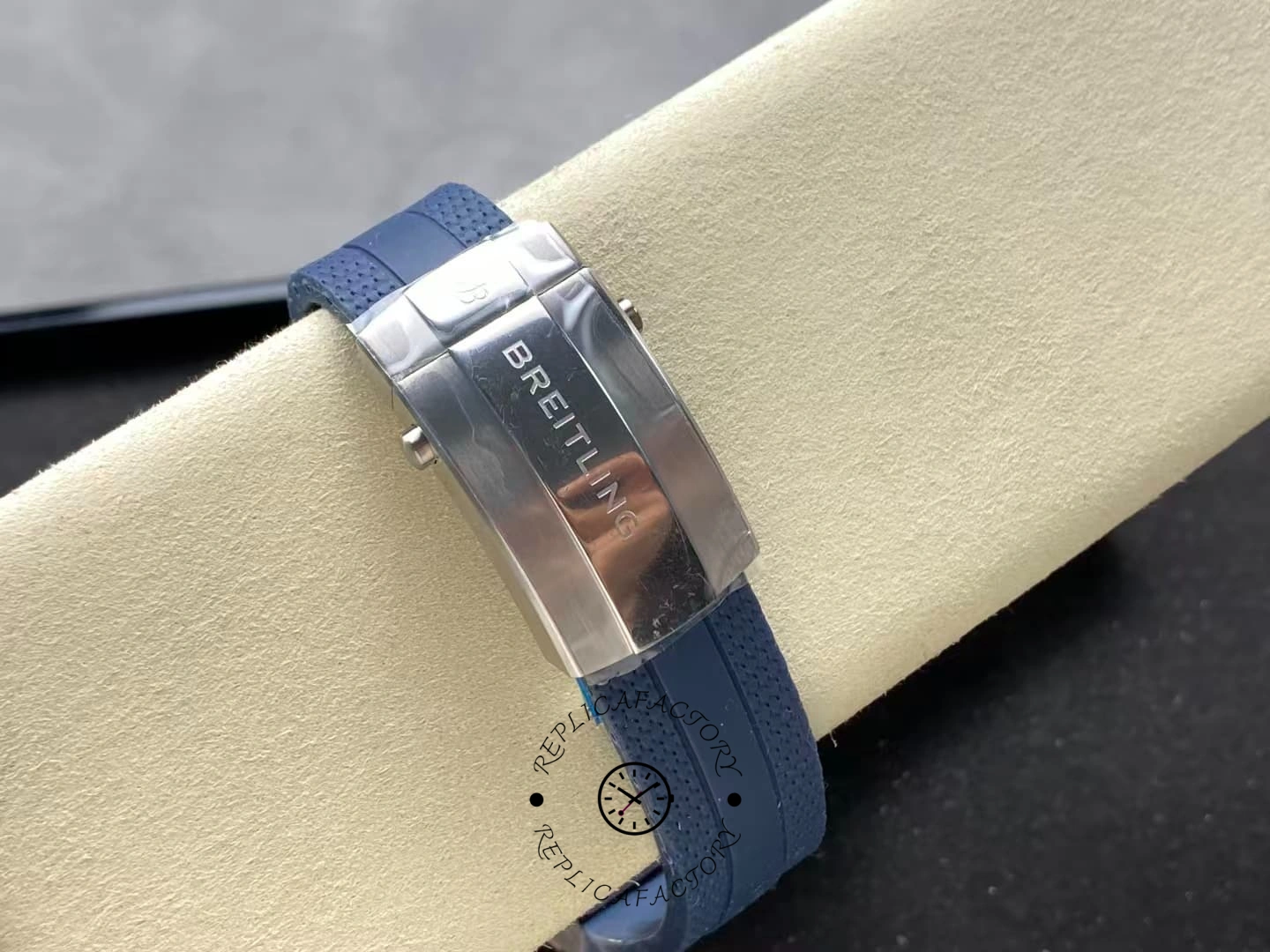 Close-up of Breitling Superocean A17375E71C1S1 clasp engraved with Breitling logo.