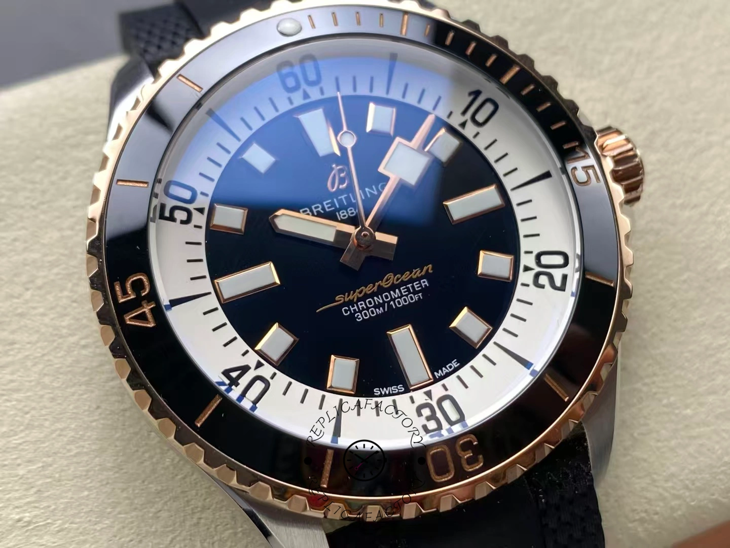 Macro shot of Breitling Superocean 42 U17375211B1S1 black dial showing luminous markers.