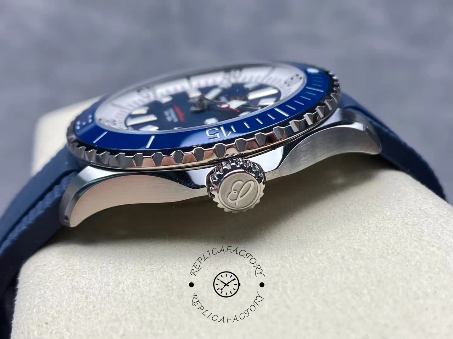 Side view of Breitling Superocean A17375E71C1S1 blue bezel and crown details.