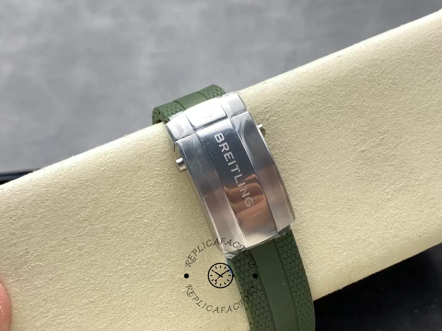 Clasp view of Breitling Superocean A173751A1O1S1 Kelly Slater Edition with green rubber strap.