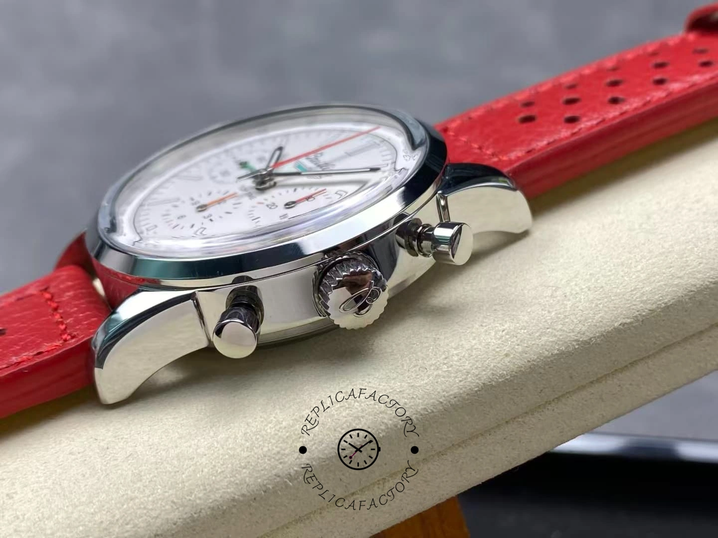 Side view of Breitling Top Time B01 AB01766A1A1X1 showing crown and pushers.