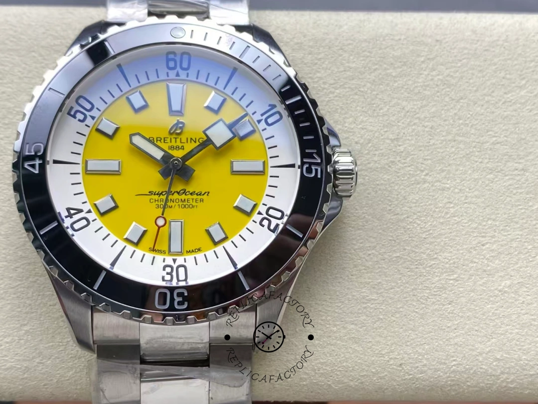Front view of Breitling Superocean 42 A17375211I1A1 yellow dial dive watch with steel bracelet. - Front view