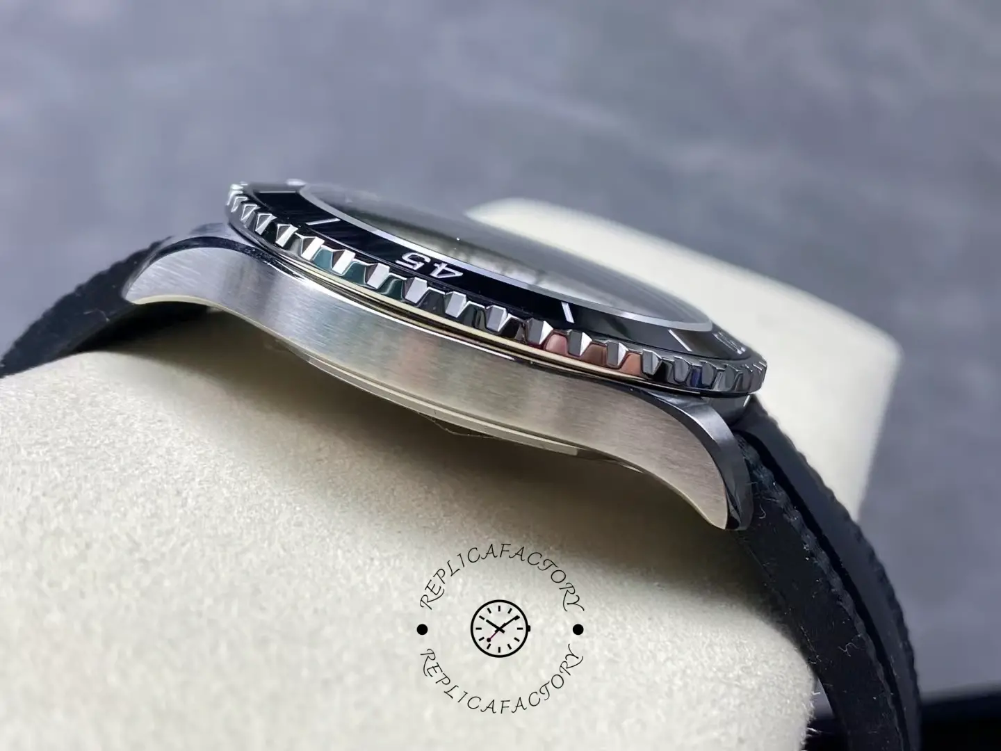 Left side of Breitling Superocean A17375211I1S1 brushed steel case and black bezel.