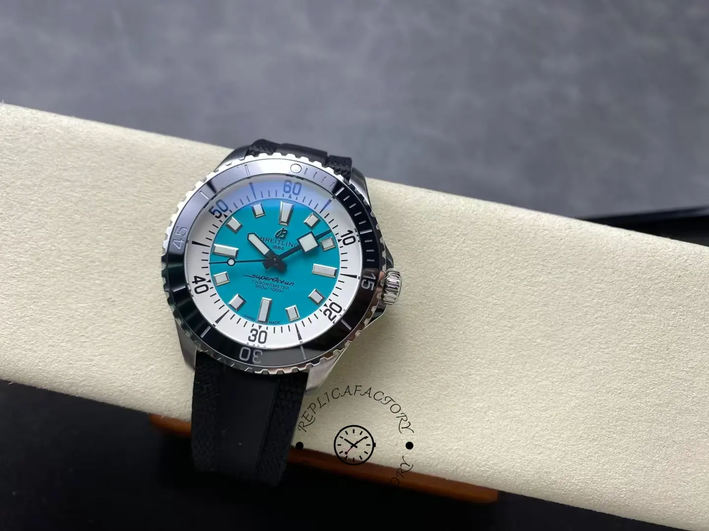 Top view of Breitling Superocean 44 A17376211L2S1 turquoise dial with black bezel and strap.