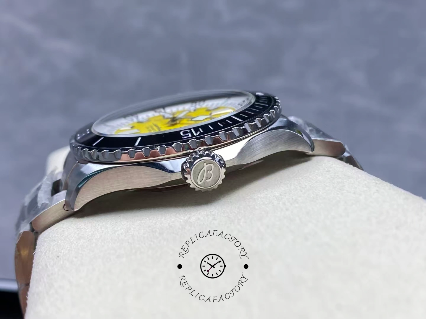 Side view of Breitling Superocean 42 A17375211I1A1 showing signed crown and bezel teeth.