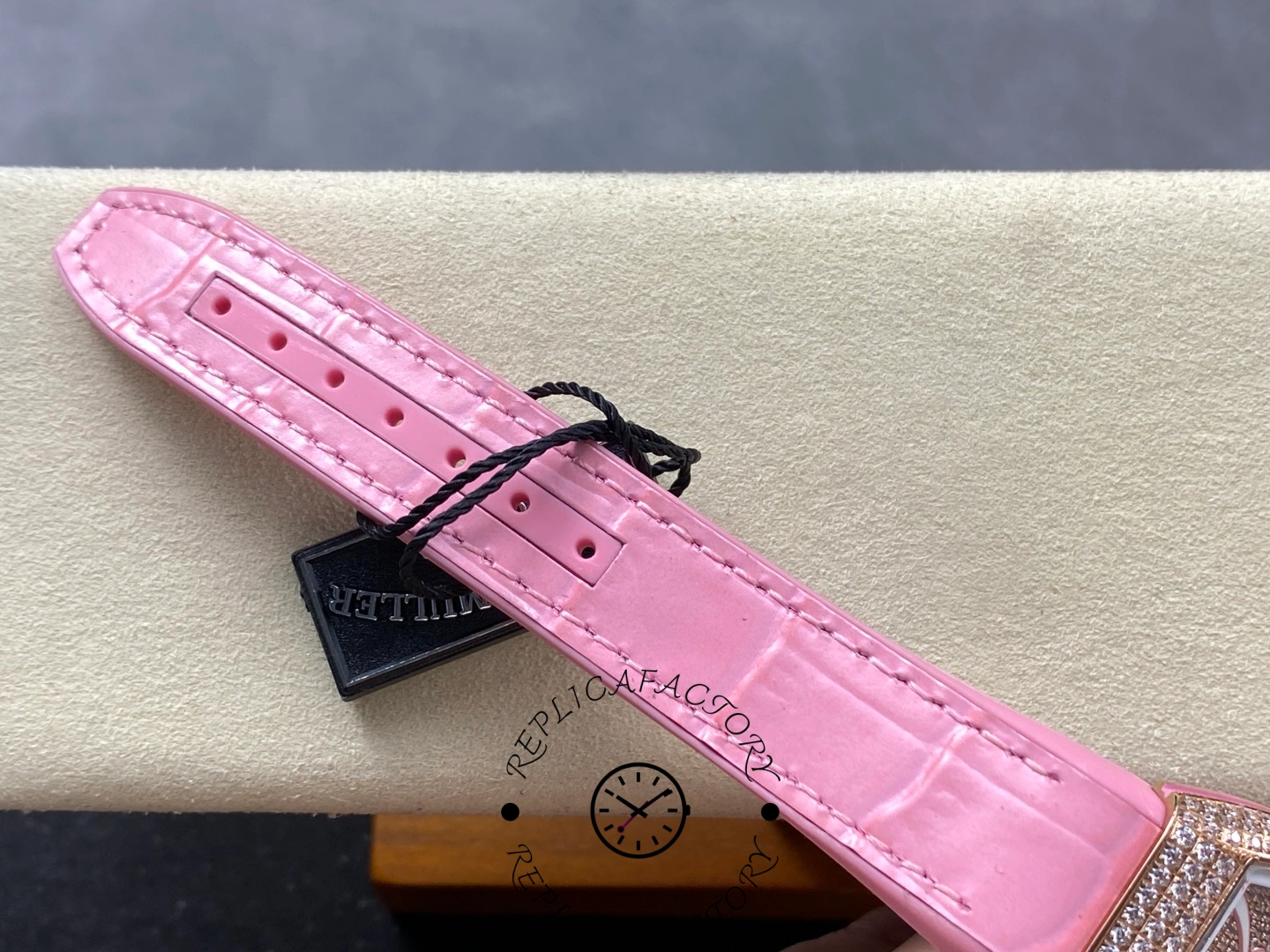 Pink leather strap of the Franck Muller V 32 SC AT FO D CD AC RS AC showing stitching detail.