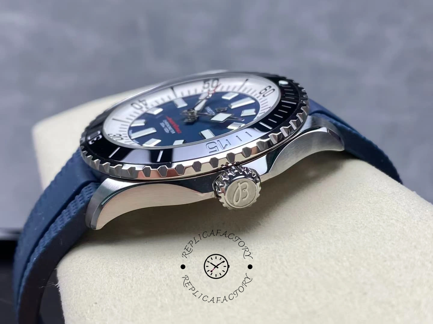 Side view of Breitling Superocean A17376211C1S1 blue dial showing crown and lugs.