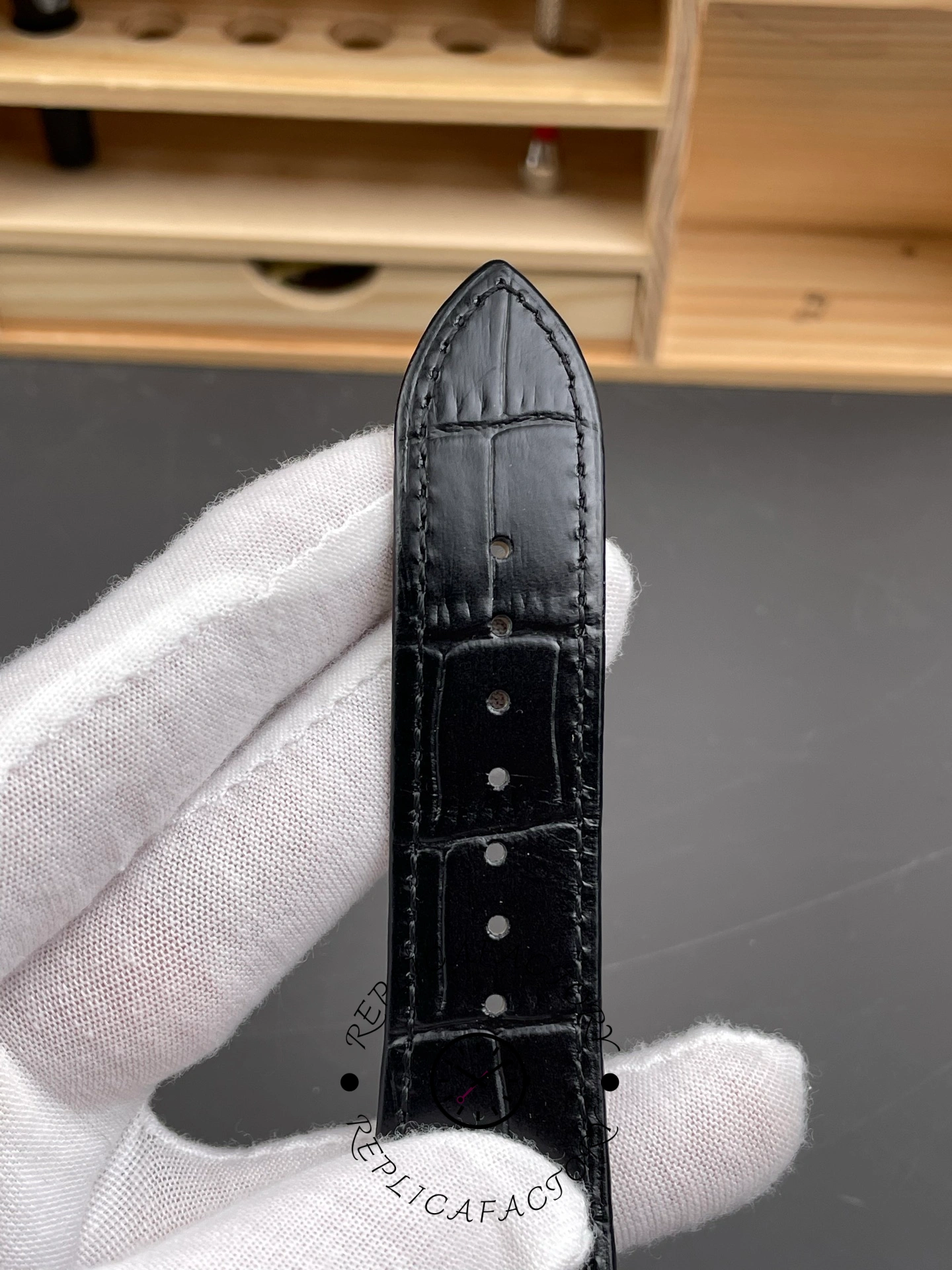 Black leather strap of the Franck Muller 6000H showing stitching details.