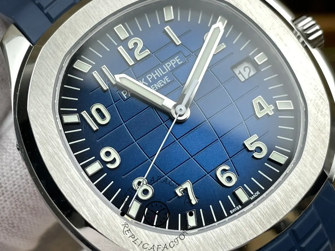 Macro shot of the Patek Philippe Aquanaut 5168G-001 displaying numerals and grid-pattern dial.