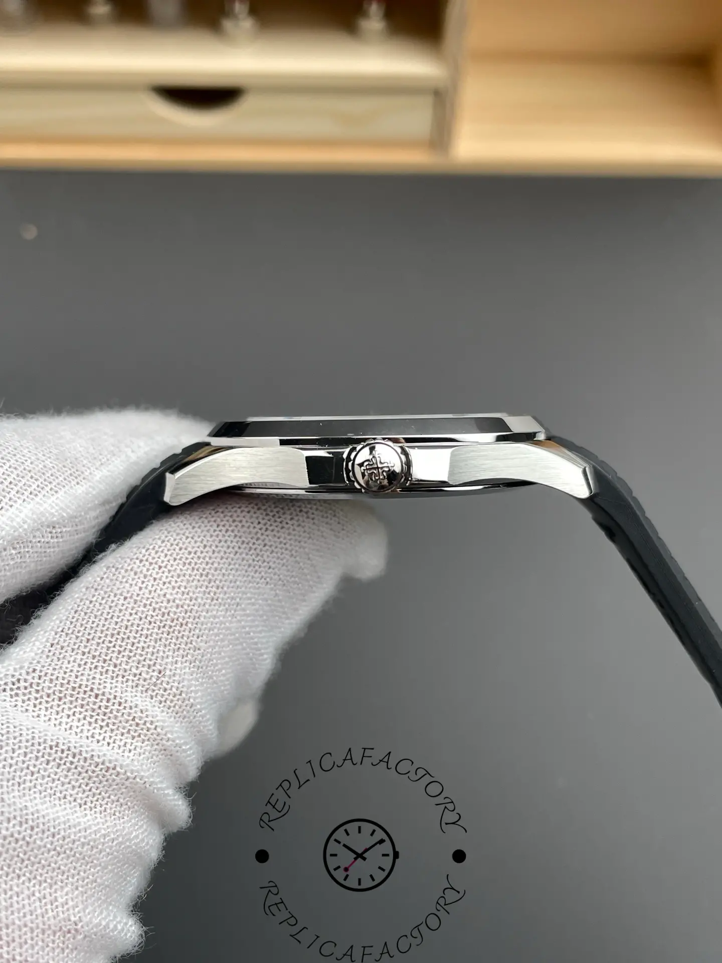 Side profile of the Patek Philippe Aquanaut 5167A-001 focusing on the crown.