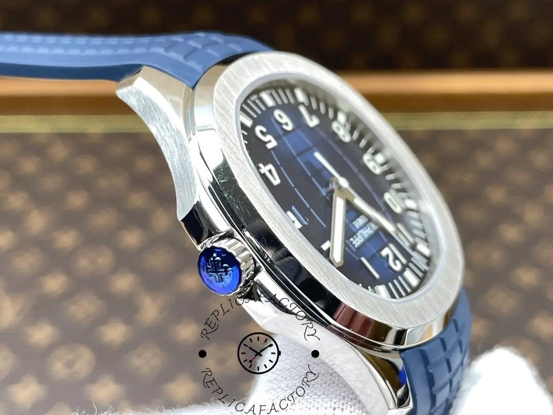Crown-side view of the Patek Philippe Aquanaut 5168G-001 with engraved logo crown.