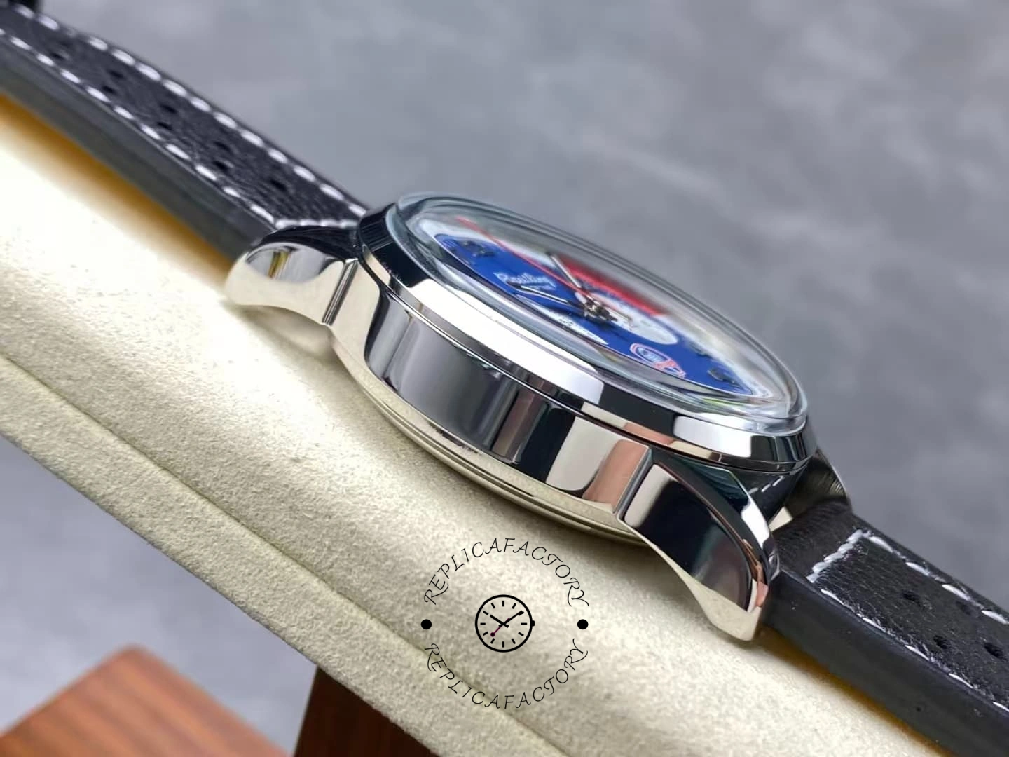 Left side of Breitling Top Time B01 Shelby Cobra AB01763A1C1X1 polished steel case.