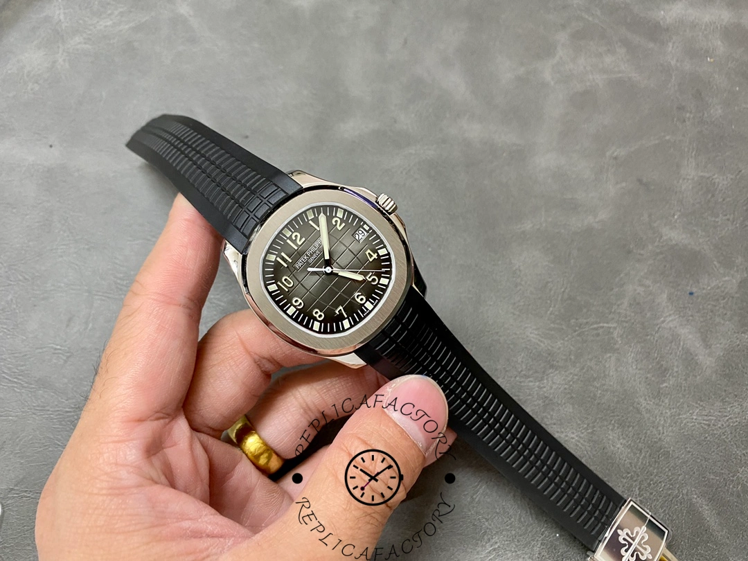 Full view of the Patek Philippe Aquanaut 5167A-001 with textured black rubber strap.