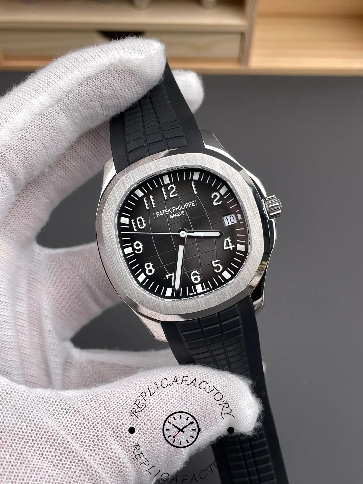Angled view of the Patek Philippe Aquanaut 5167A-001 with brushed bezel and black dial.