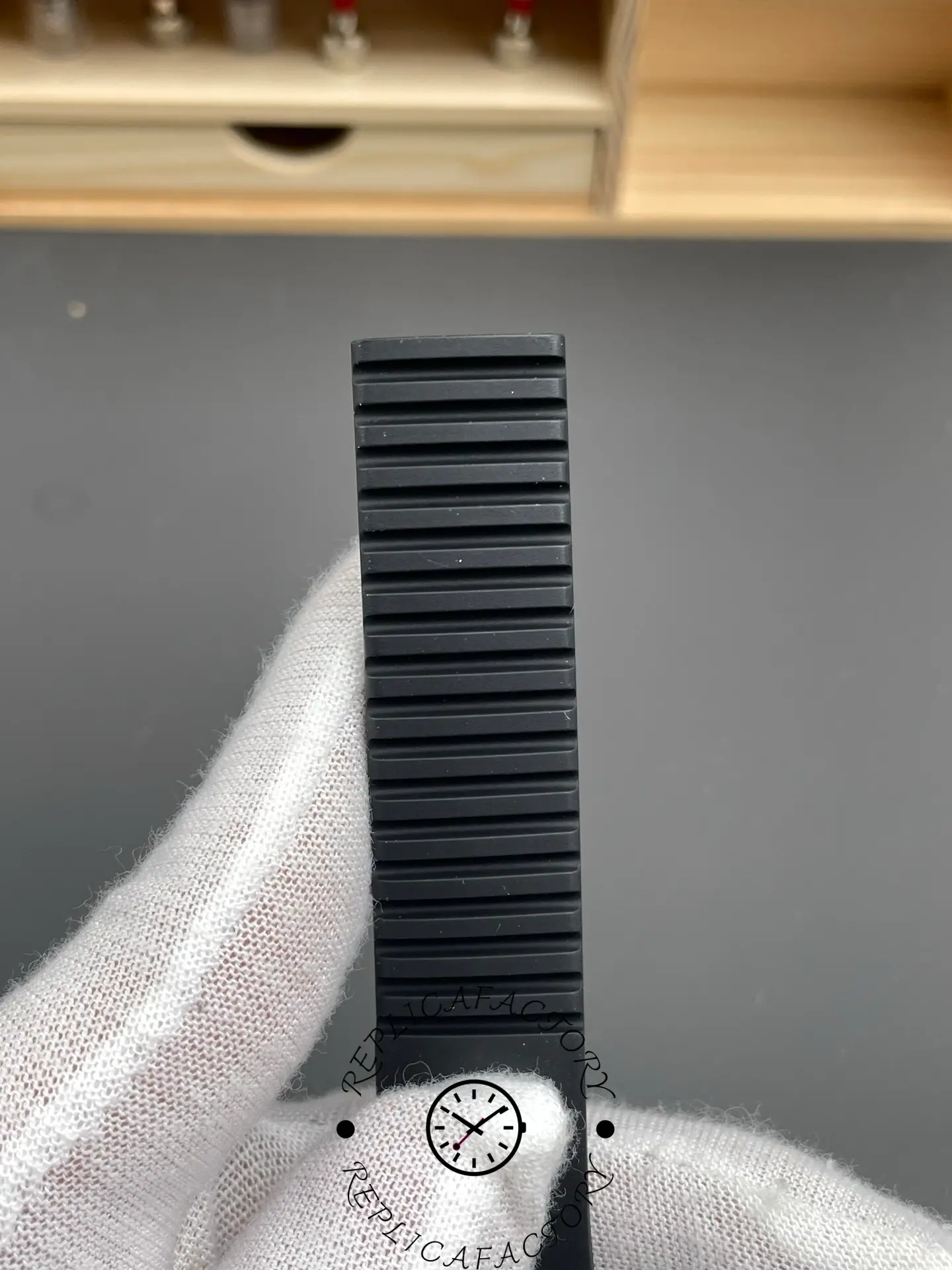 Rubber strap detail of the Patek Philippe Aquanaut 5167A-001 in black.