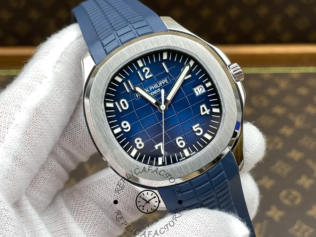 Detailed front angle of the Patek Philippe Aquanaut 5168G-001 showing polished bezel and dial texture.