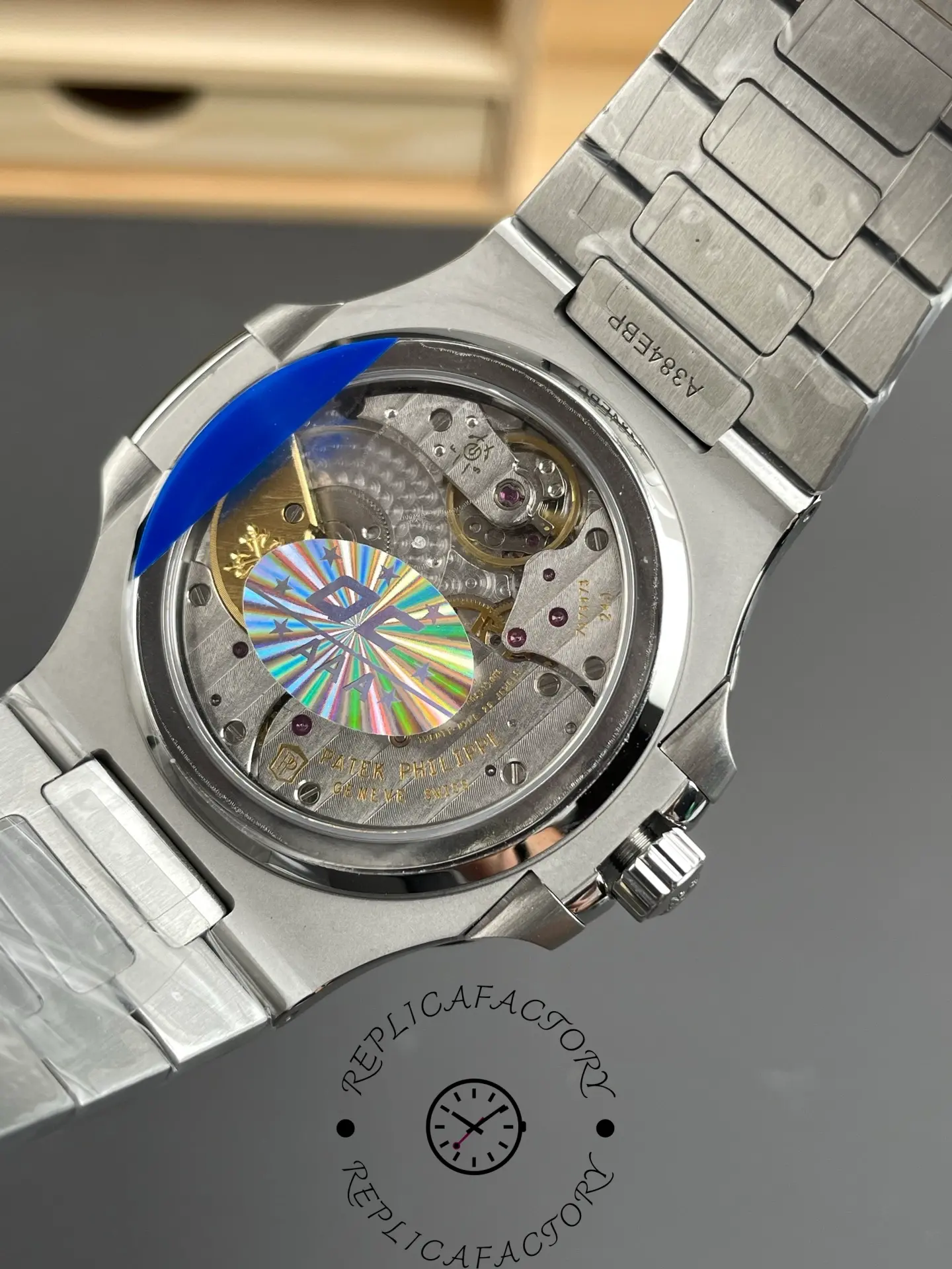 Caseback view of the Patek Philippe Nautilus 5712/1A-001 showing automatic movement through sapphire back.
