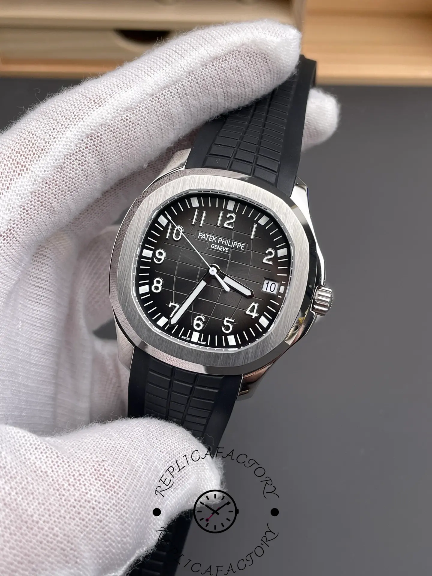 Close-up of the Patek Philippe Aquanaut 5167A-001 showing the date window and markers.