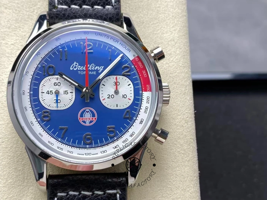 lose-up of Breitling Top Time B01 Shelby Cobra AB01763A1C1X1 blue dial with Cobra logo. - Front view