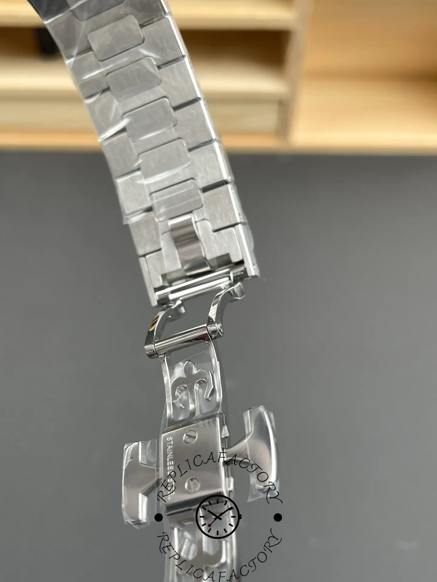 Open clasp view of the Patek Philippe Nautilus 5712/1A-001 showing deployant buckle design.
