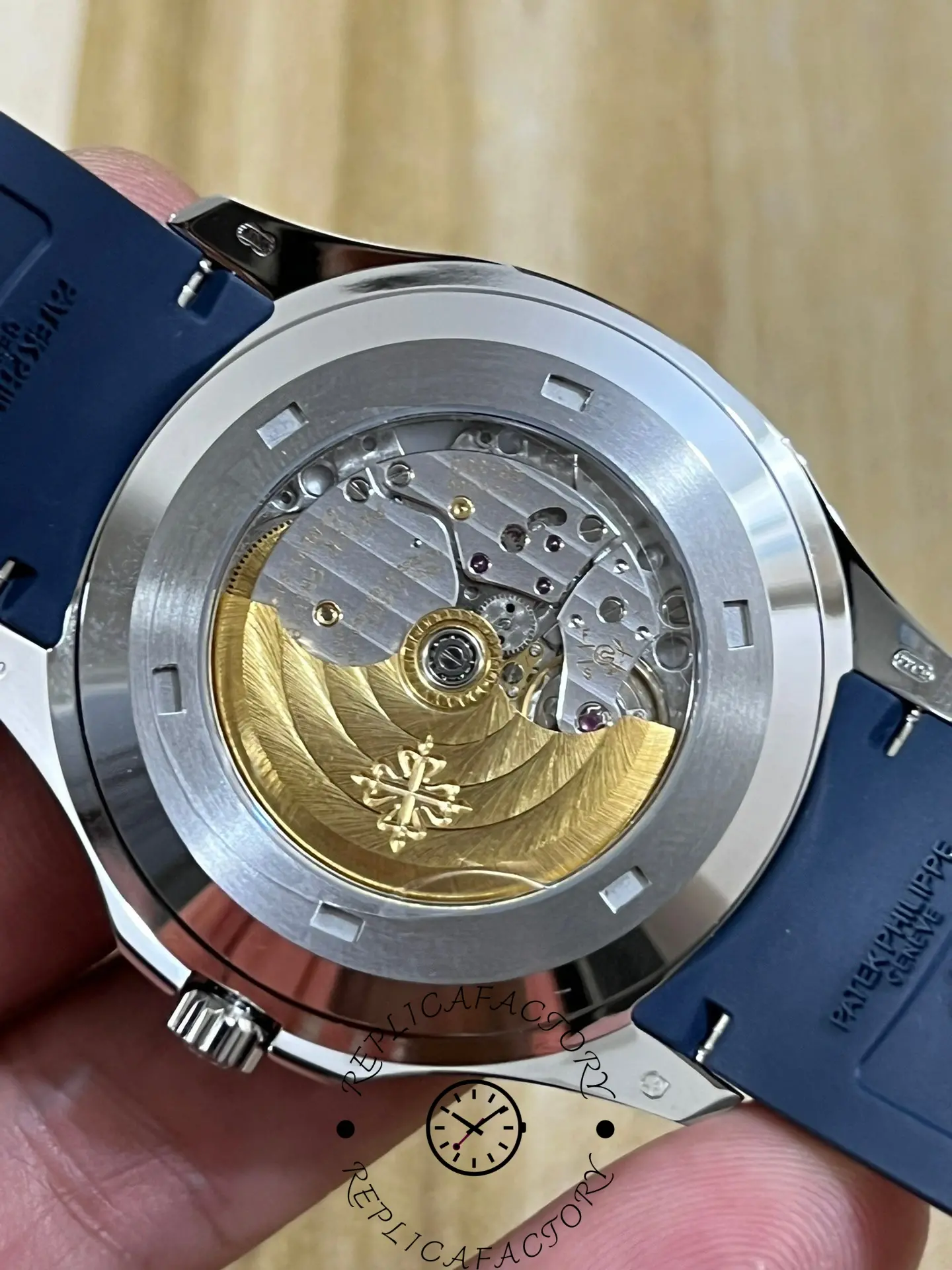 Exhibition caseback of the Patek Philippe Aquanaut 5164G-001 displaying the automatic movement.